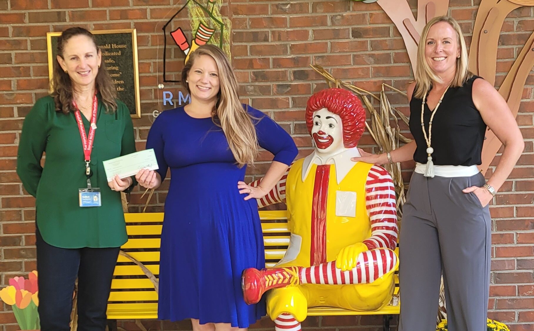 Ronald McDonald House Charities of Greater Charlotte receives the next $1,000 donation from M&G Gives